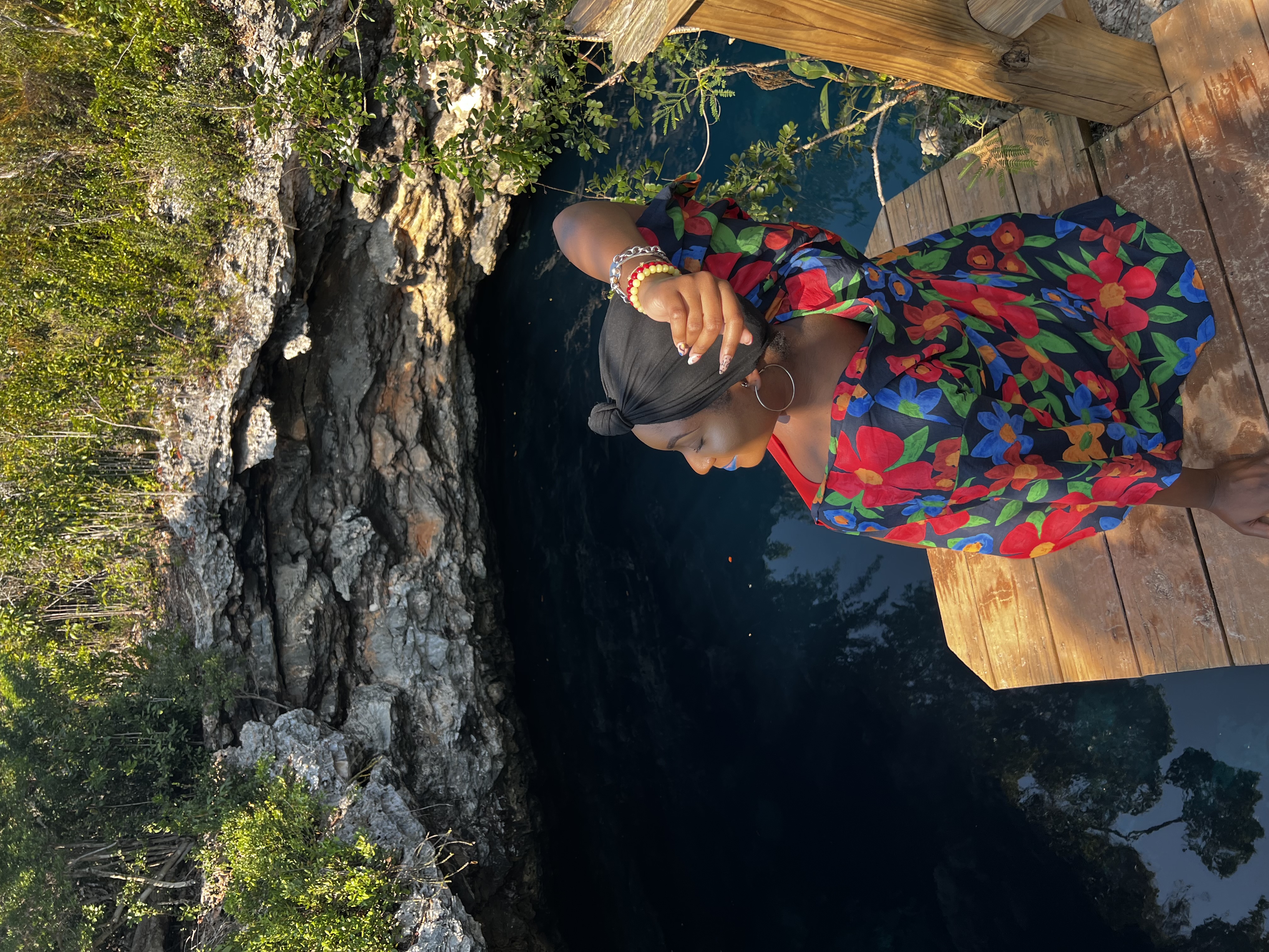 Maradona on the wooden platform above the Sapphire Hole in Eleuthera
