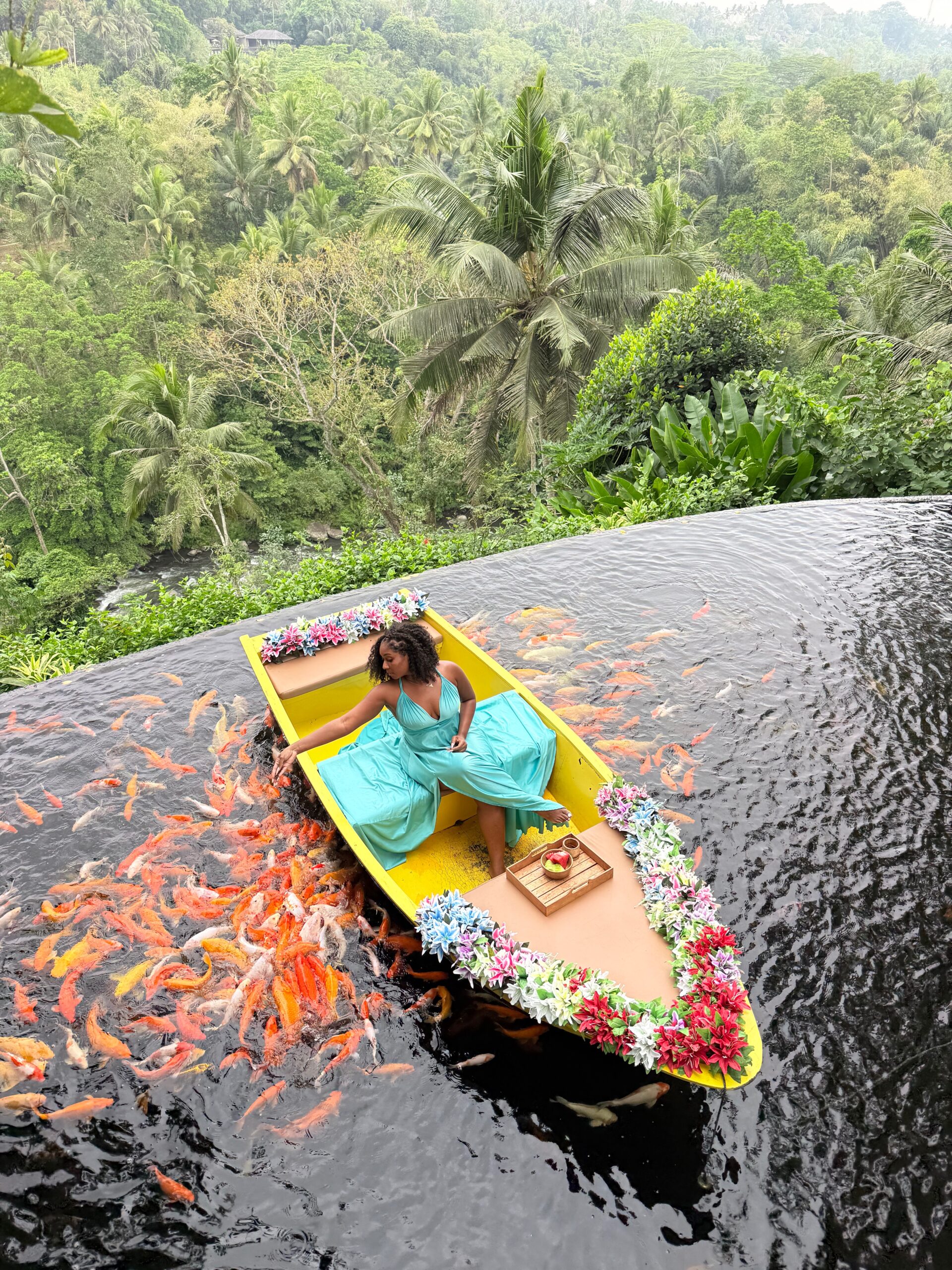 Maradona floating in a canoe at a jungle pool in Bali